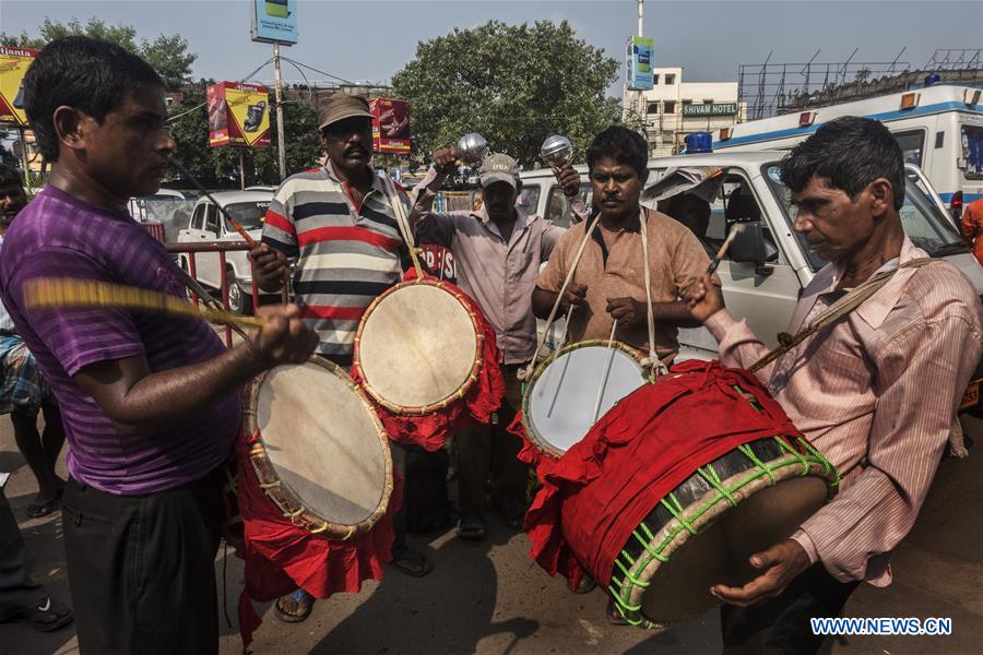 INDIA-KOLKATA-DURGA PUJA-FESTIVAL-TRADITIONAL DRUMMER