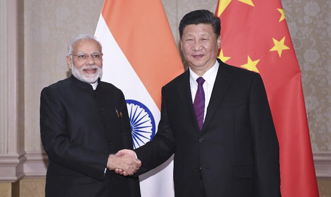 Xi says China to boost closer development partnership with India