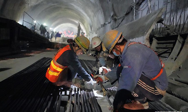 New Badaling tunnel of Beijing-Zhangjiakou high-speed rail line cut through