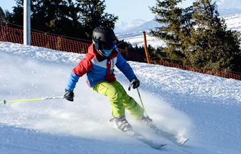 Ski enthusiasts seen at ski resort in Urumqi, NW China's Xinjiang